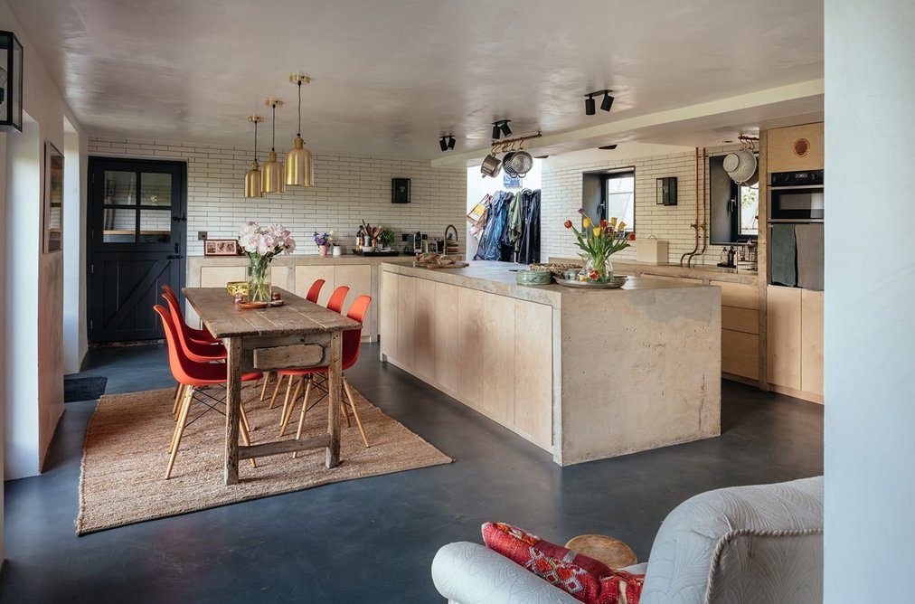 concrete-worktops-and-exposed-copper-pipes-in-the-kitchen