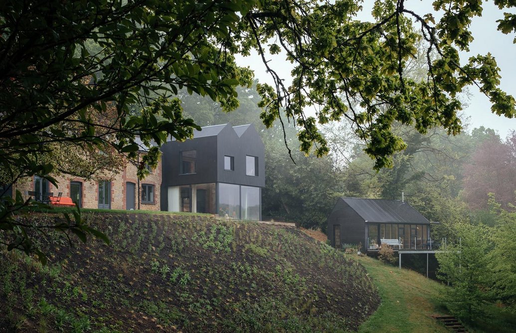 the-brief-included-a-stand-alone-studio-for-each-partner-one-on-either-side-of-the-site